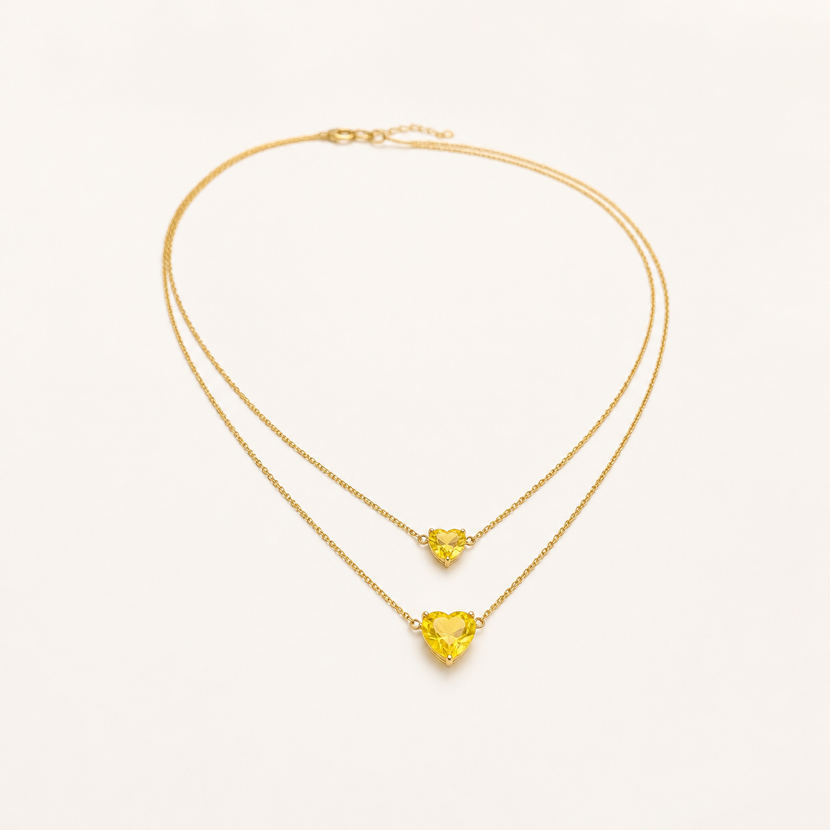 Colar Duplo Folheado a Ouro 18k Corações de Cristal Amarelo
