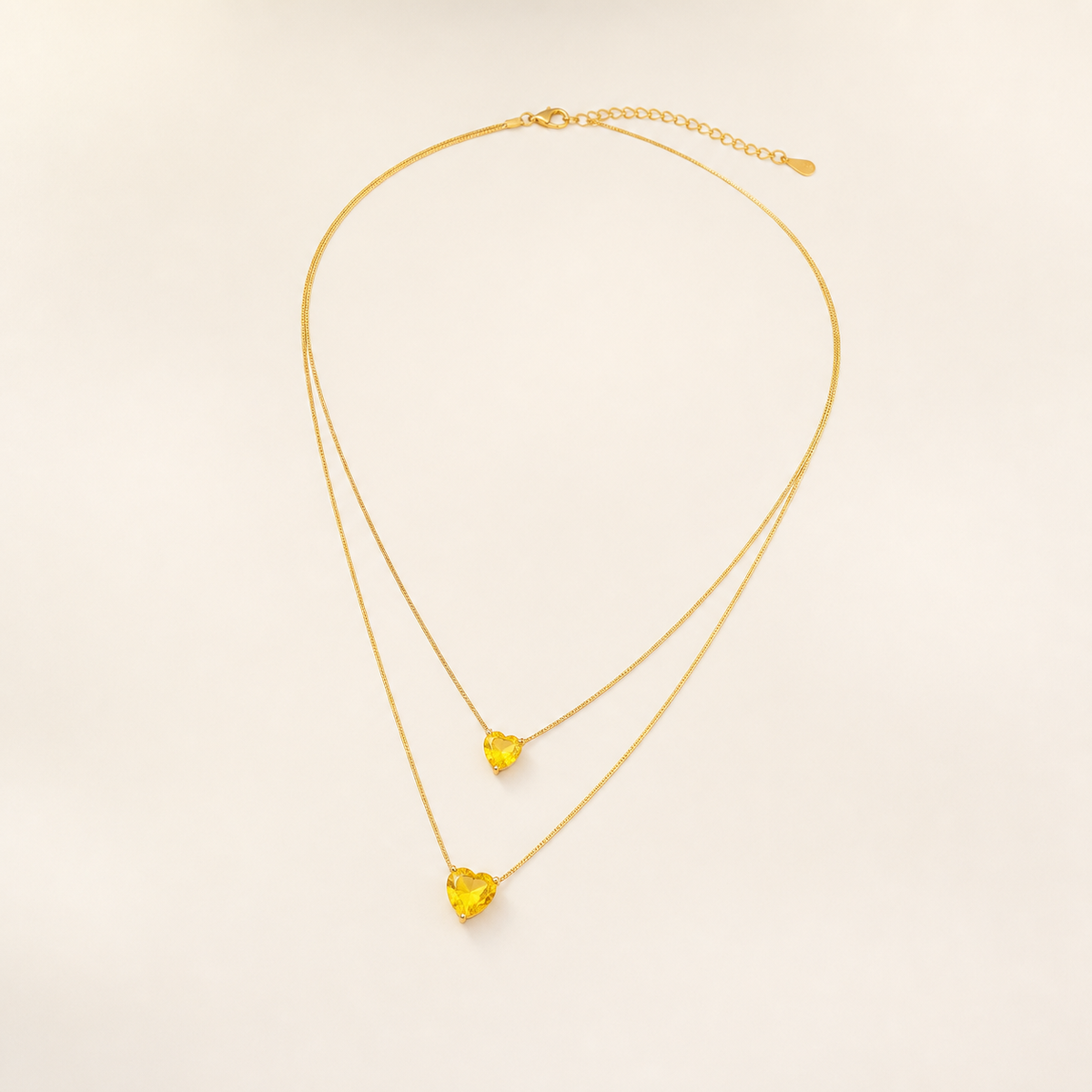 Colar Duplo Folheado a Ouro 18k Corações de Cristal Amarelo